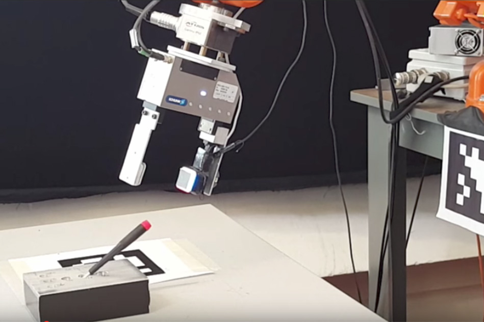 A GelSight sensor attached to a robot’s gripper enables the robot to determine precisely where it has grasped a small screwdriver, removing it from and inserting it back into a slot, even when the gripper screens the screwdriver from the robot’s came