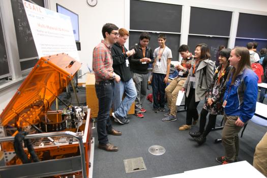 CSAIL research engineer JavierRamos shows off MultiFab, a 3-D-printer that can print 10 different materials at the same time using special computer-vision techniques.