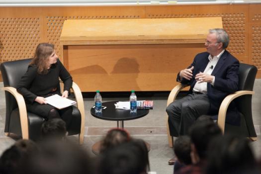 MIT Professor Daniela Rus (left), director of the Computer Science and Artificial Intelligence Laboratory, speaks with Alphabet's Eric Schmidt.