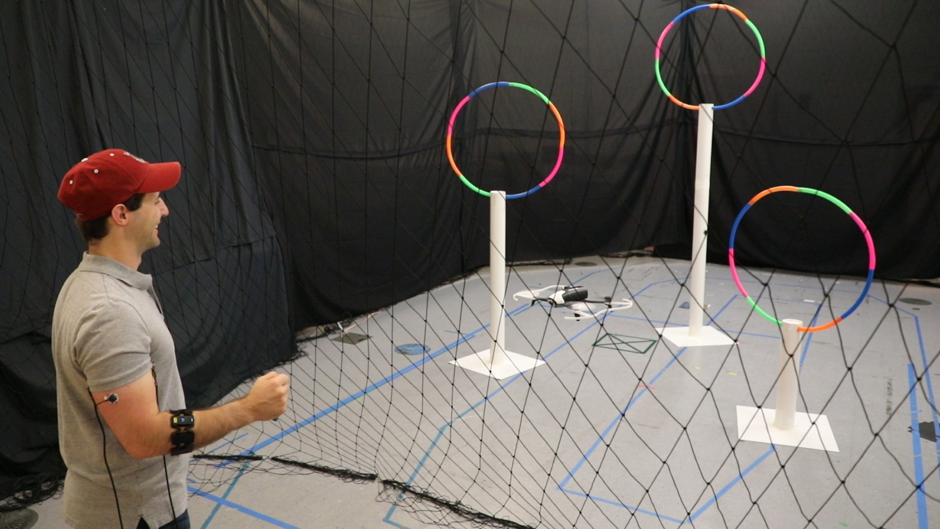Pilot a drone through hoops using gestures and wearable sensors