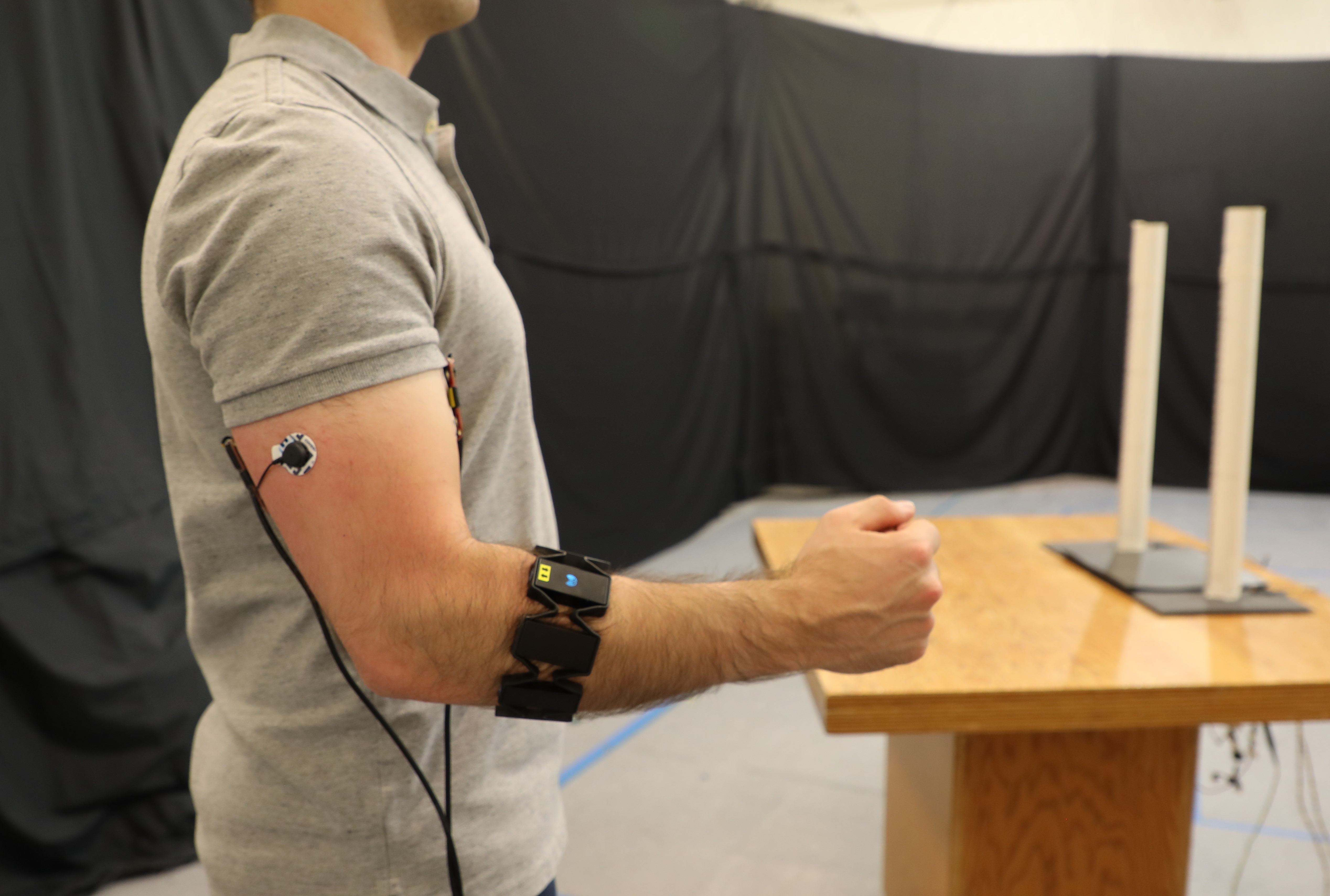 EMG sensors monitor biceps, triceps, and forearm muscles.  The forearm device also includes an IMU.