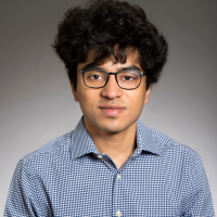 Portrait photo of face and blue shirt