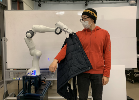 Robot assisted dressing