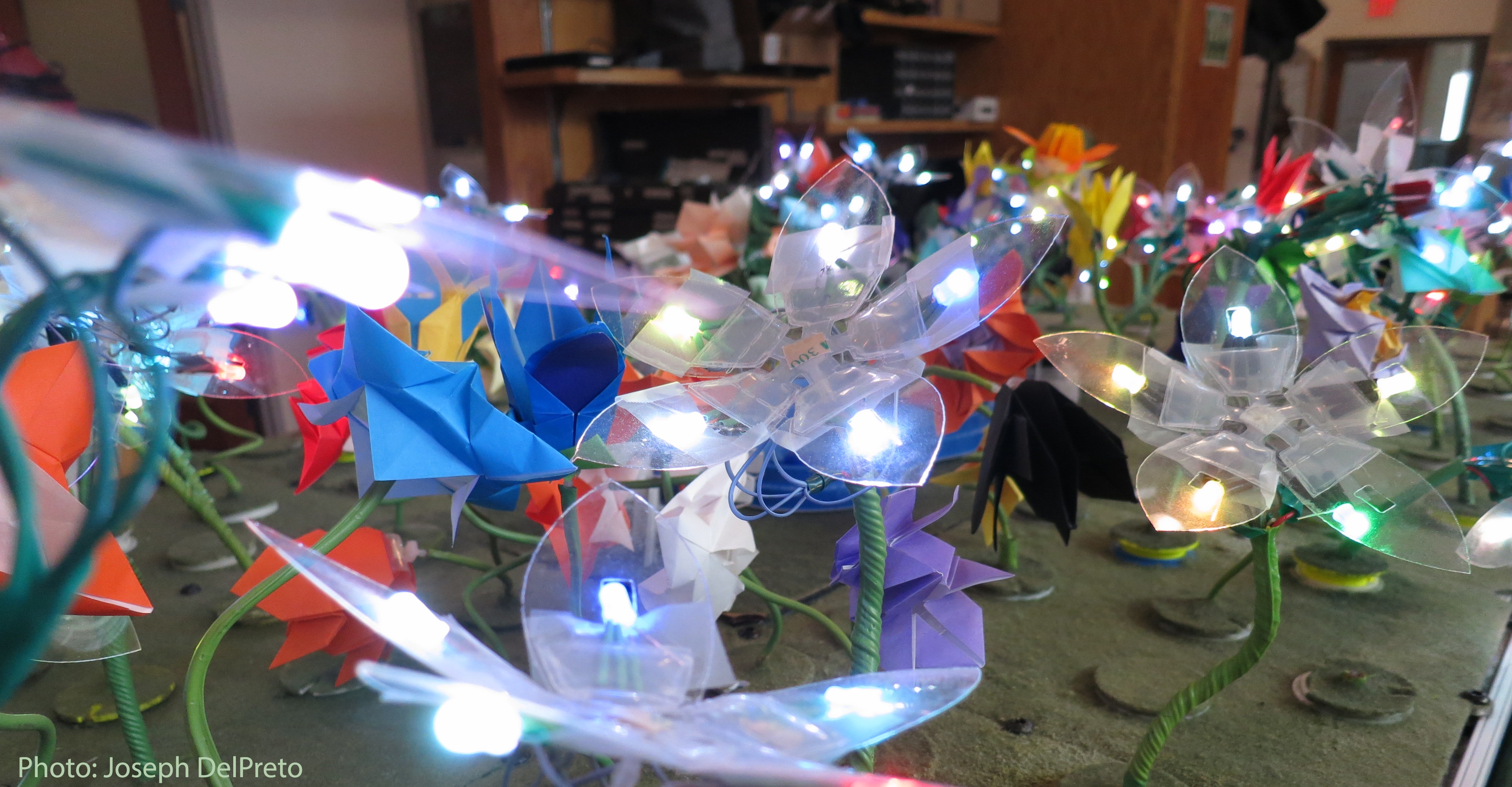The distributed robot garden, with pneumatically actuated origami flowers and LEDs