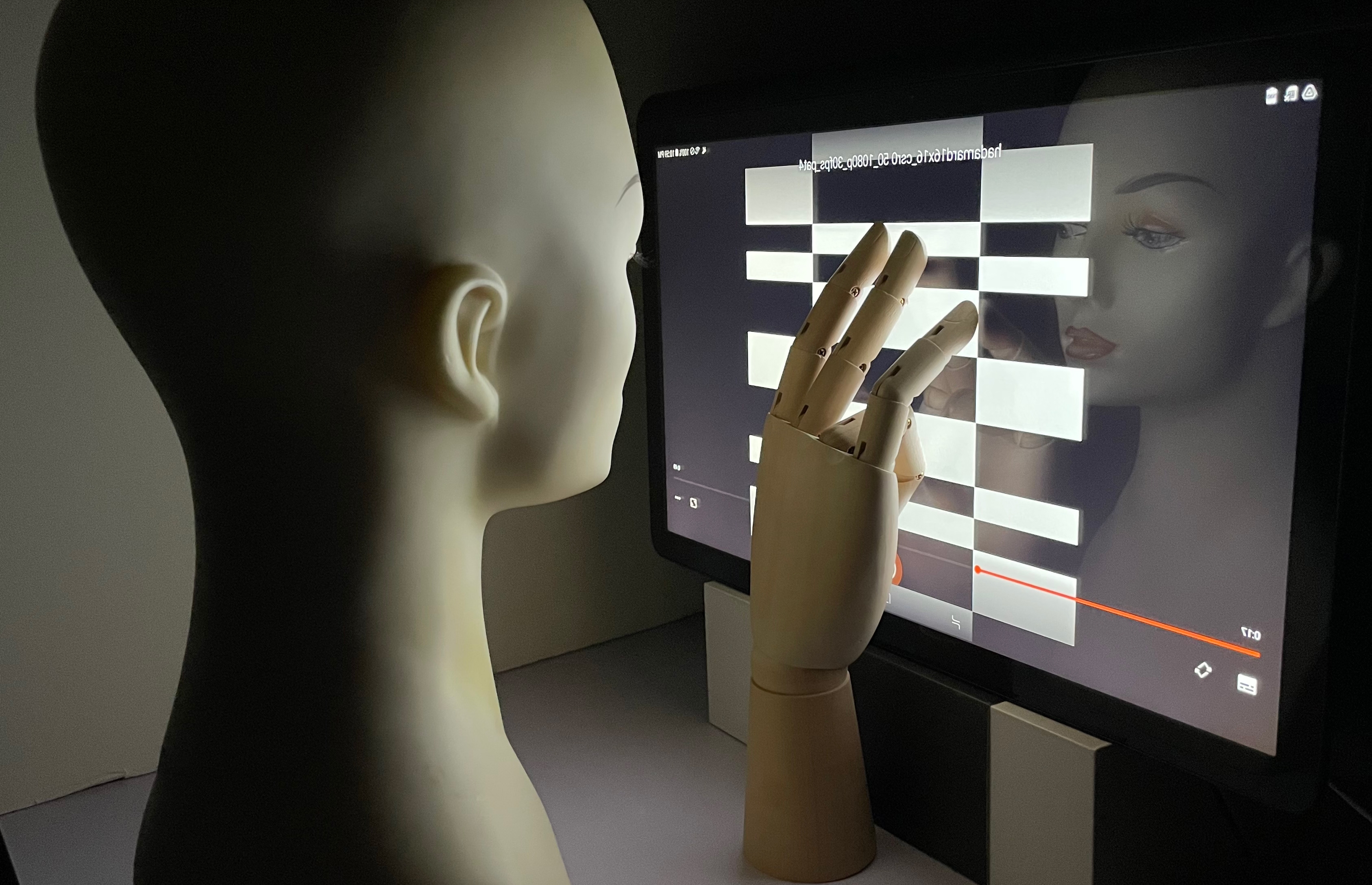 Imaging privacy threats revealing touch detection in front of the screen. The ambient light sensor is embedded in a 17.3-inch Android tablet, which reveals in-contact touch by combining with its display screen.